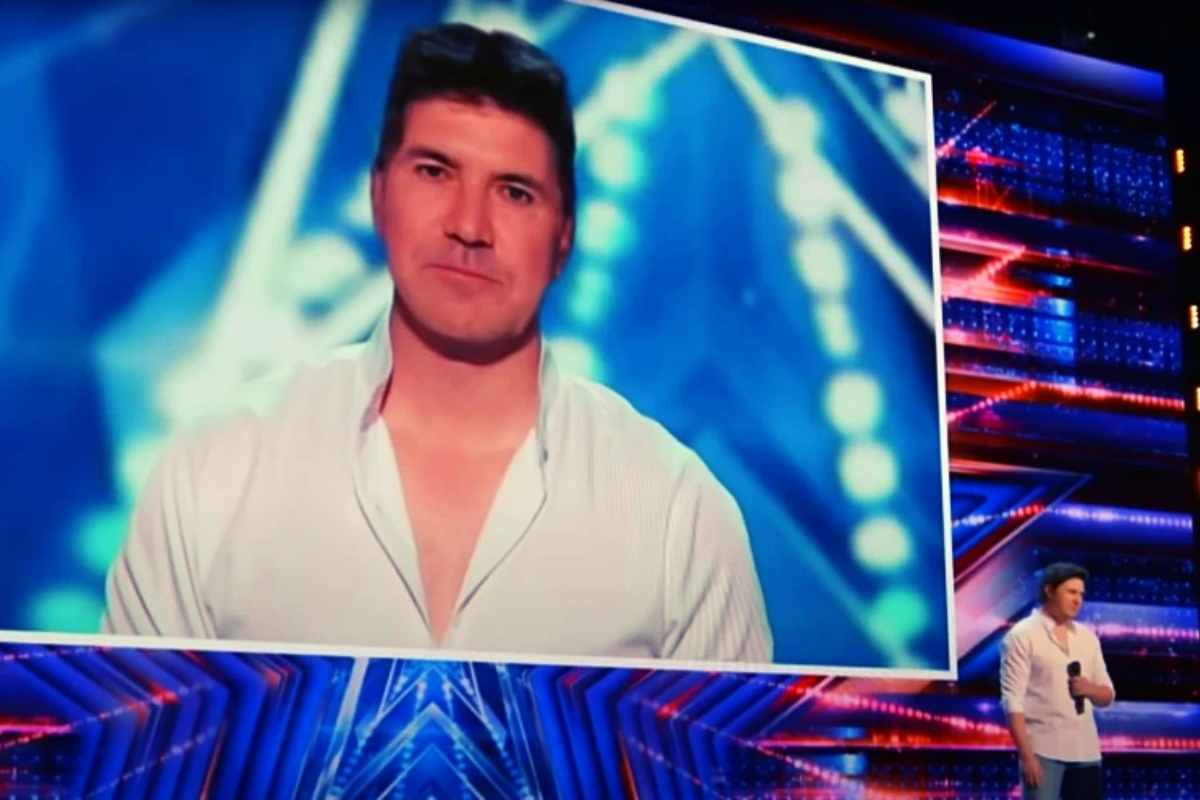 Daniel Emmet transformed into Simon Cowell onstage, thanks to AI technology