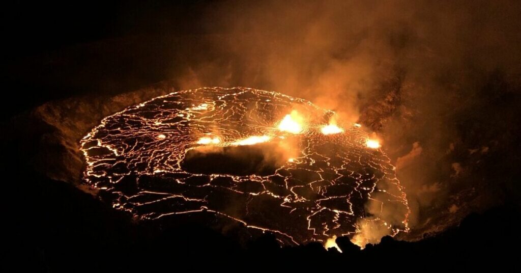 The Kilauea Volcano In Hawaii Erupts Again, And The Top Of The Crater Glows