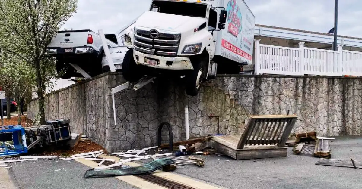 Truck Hangs Over a Wall in Norfolk